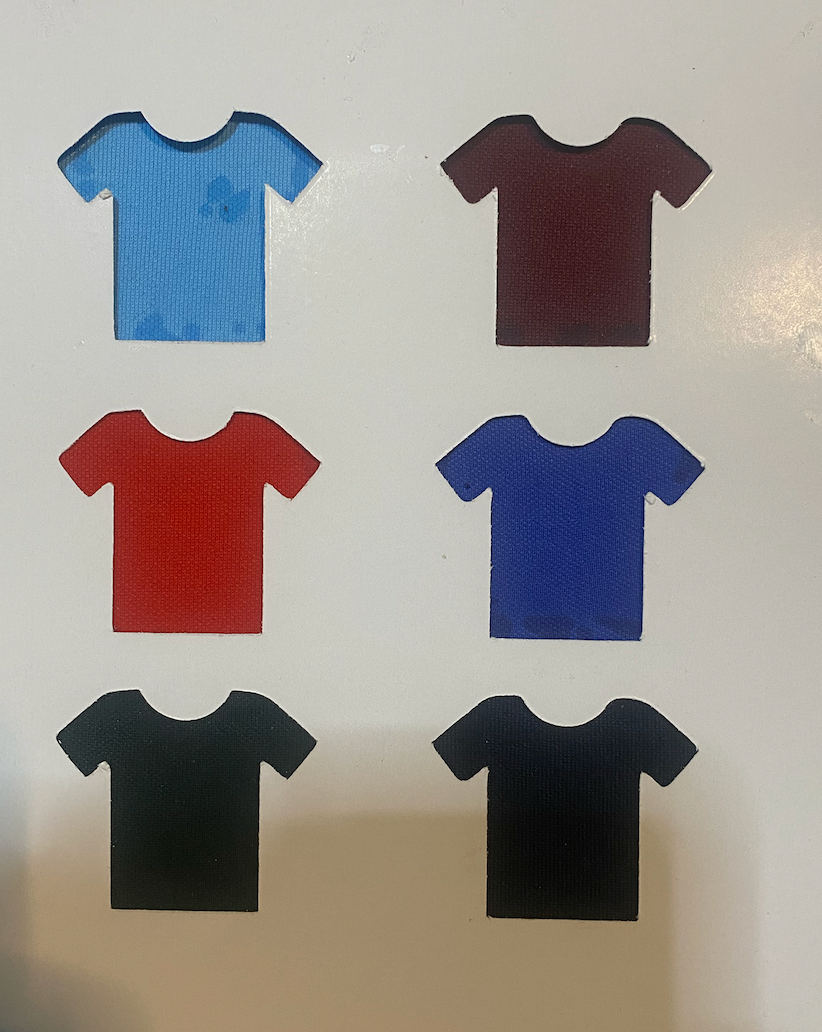 Six color swatches in t-shirt shapes for customizable corporate apparel options