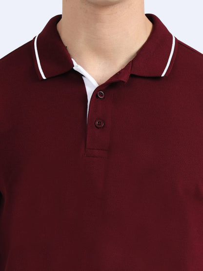 Maroon polo shirt with white collar stripe, button placket, and textured fabric