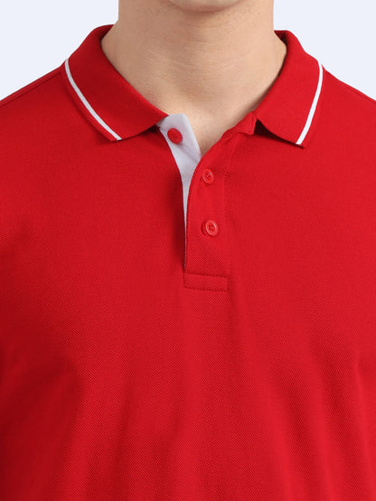 Close-up of a red polo shirt with white collar trim, ideal for corporate gifting.