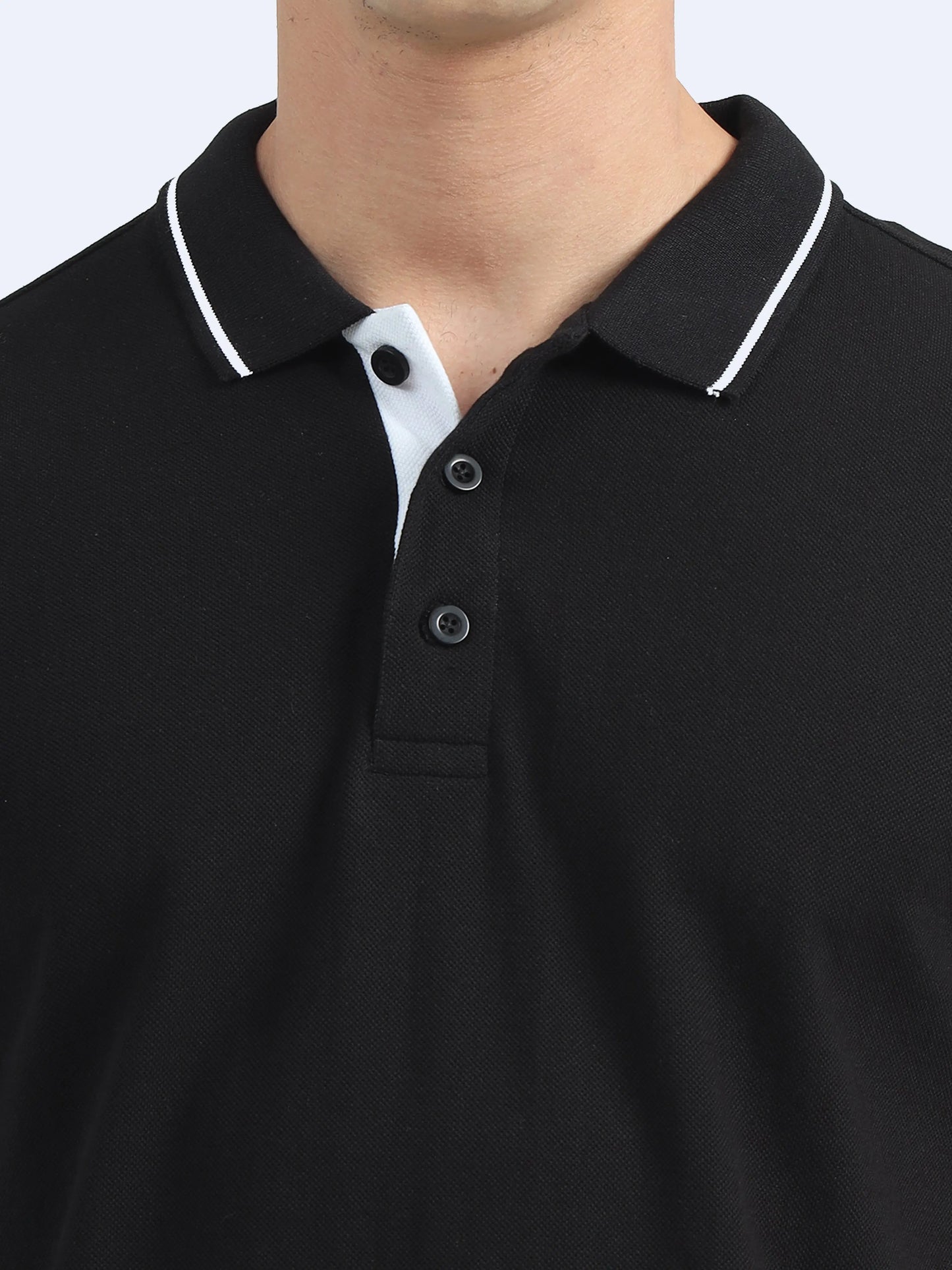 Black polo t-shirt with white tipping on collar and white button placket, ideal for corporate gifts
