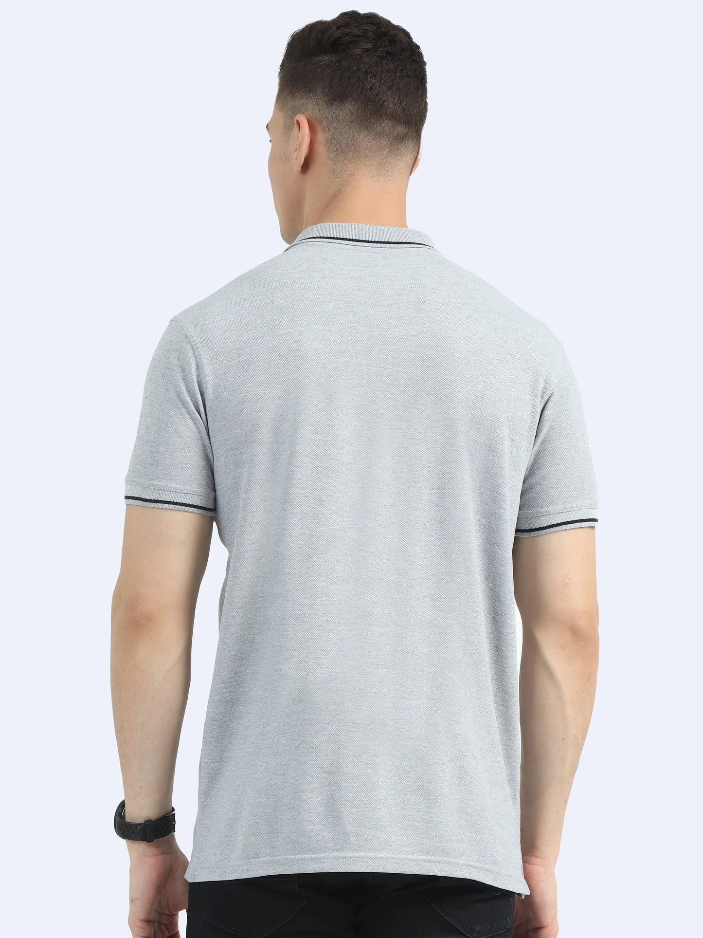 Back view of man wearing light grey polo t-shirt, ideal for corporate gifting