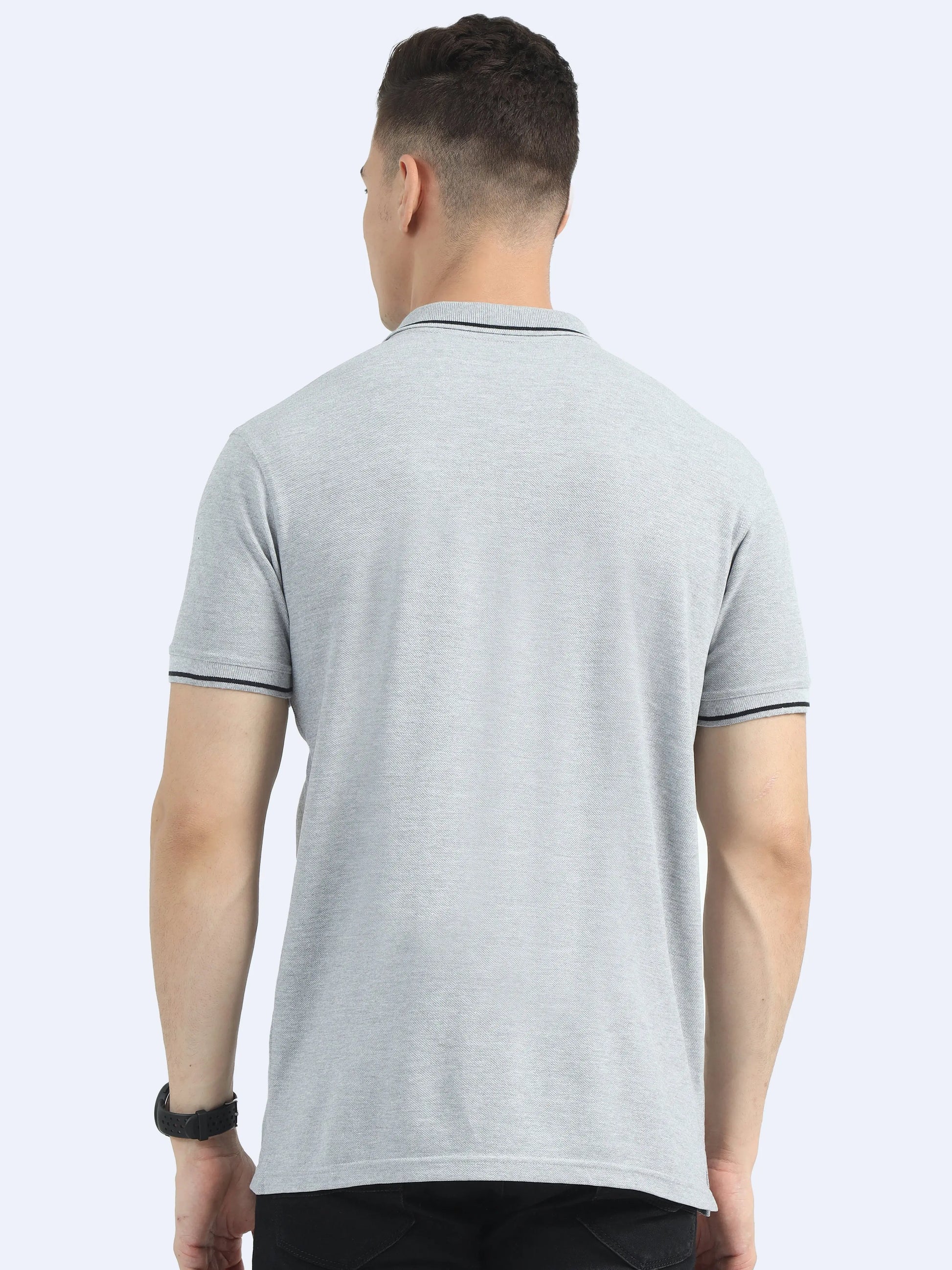 Back view of man wearing light grey polo t-shirt, ideal for corporate gifting