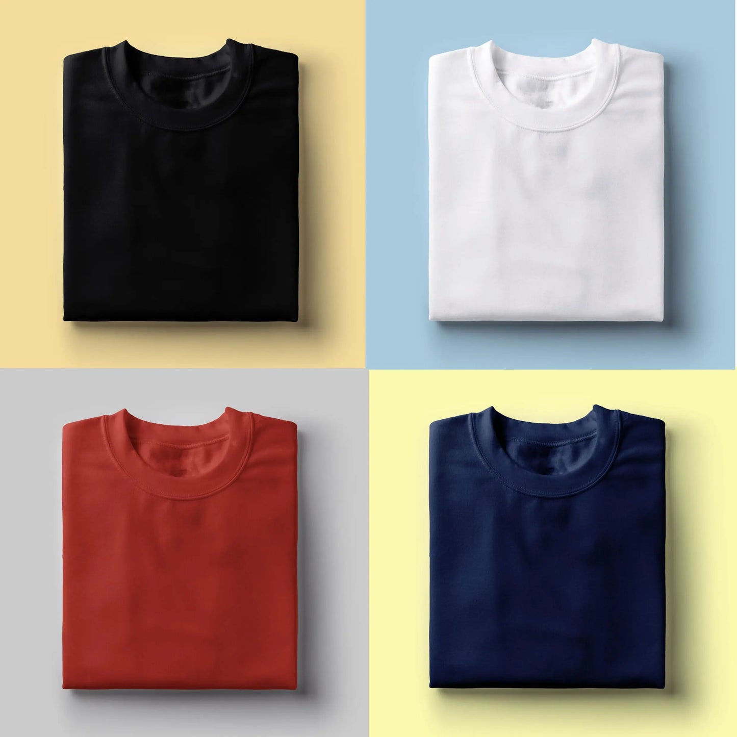 Folded plain t-shirts in black, white, red, and navy, ideal for corporate gifts