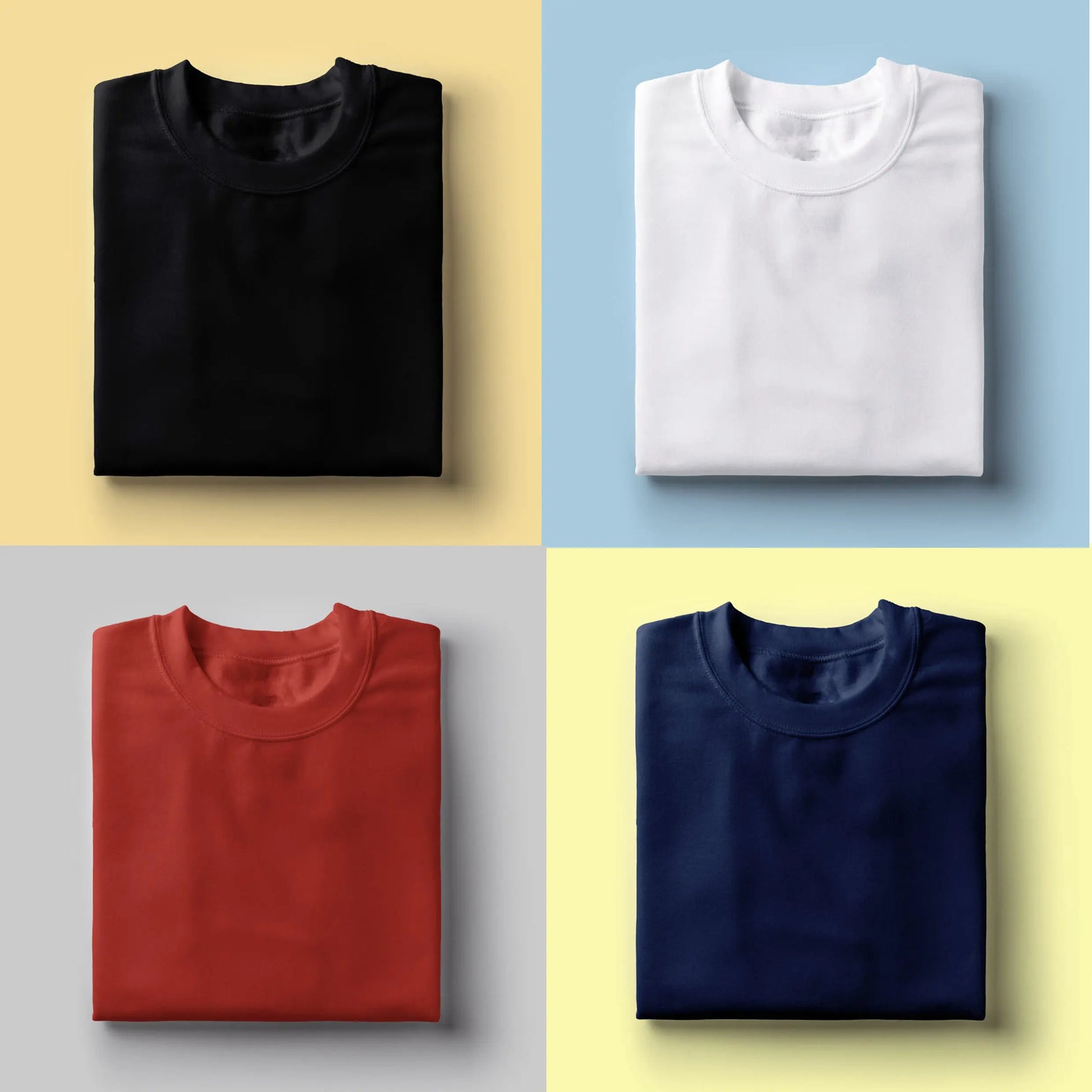 Folded plain t-shirts in black, white, red, and navy, ideal for corporate gifts